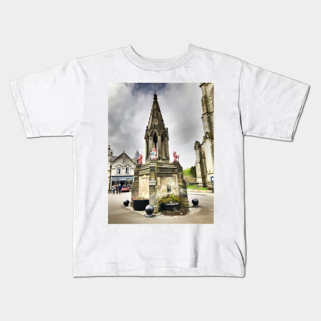 the Bruce Fountain, Falkland , Fife, Scotland Kids T-Shirt by goldyart